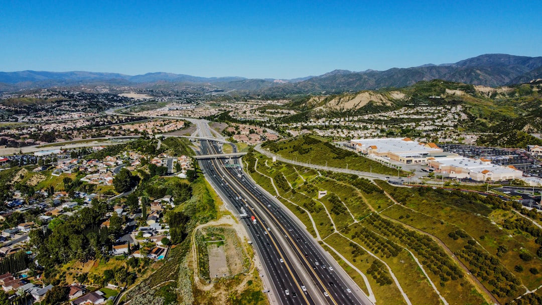 Aerial view of Santa Clarita California with highways, neighborhoods, and mountains — a local SEO checklist for small businesses in Santa Clarita California helps them get found in this growing city